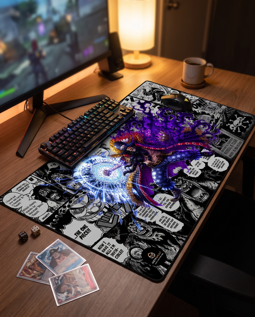 Blackbeard One Piece playmat on a gaming desk setup with keyboard and cards